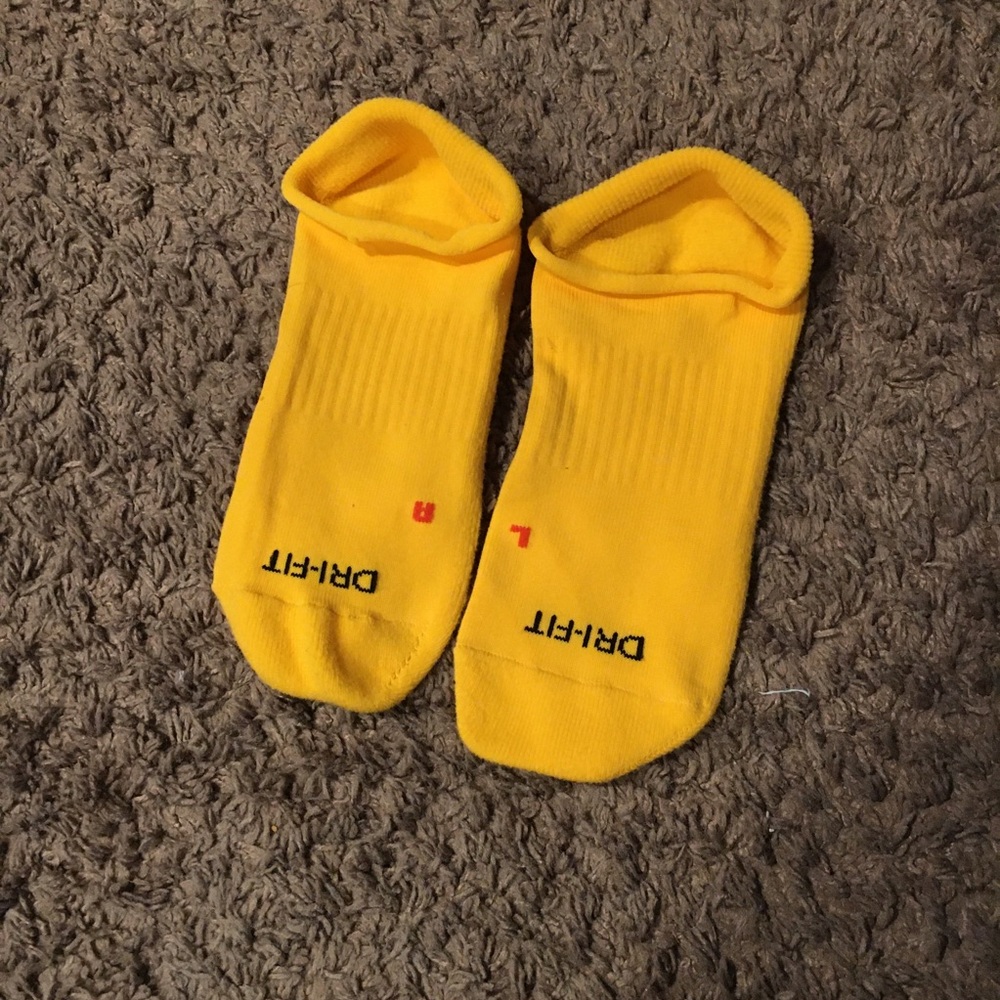 Fun pair of no show style Nike socks size small
